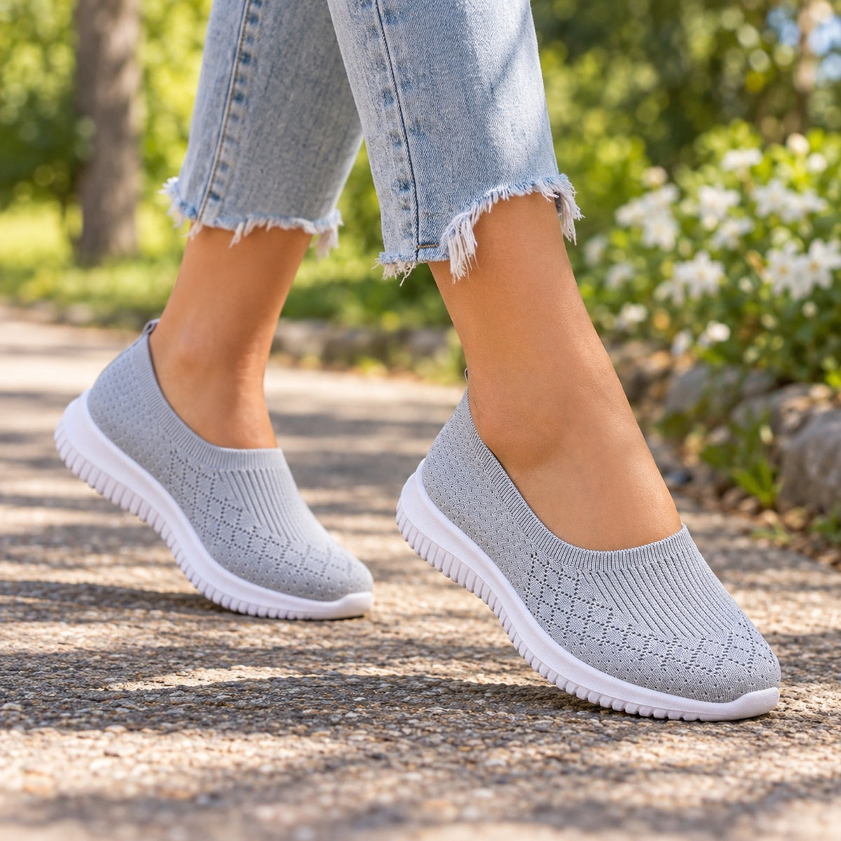 Everly – Unisex Slip-On Sneakers, worn on a walk